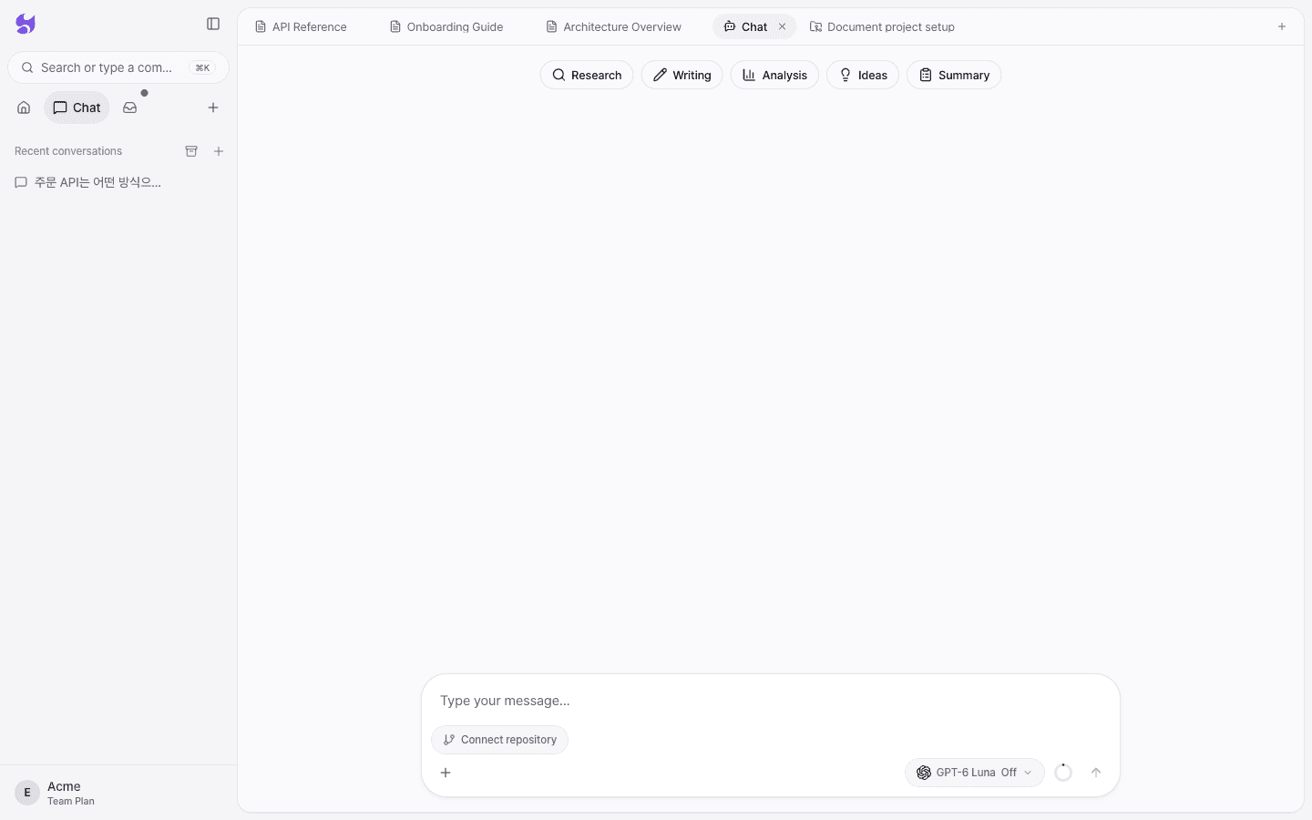 The new chat screen with example request buttons and a message box
